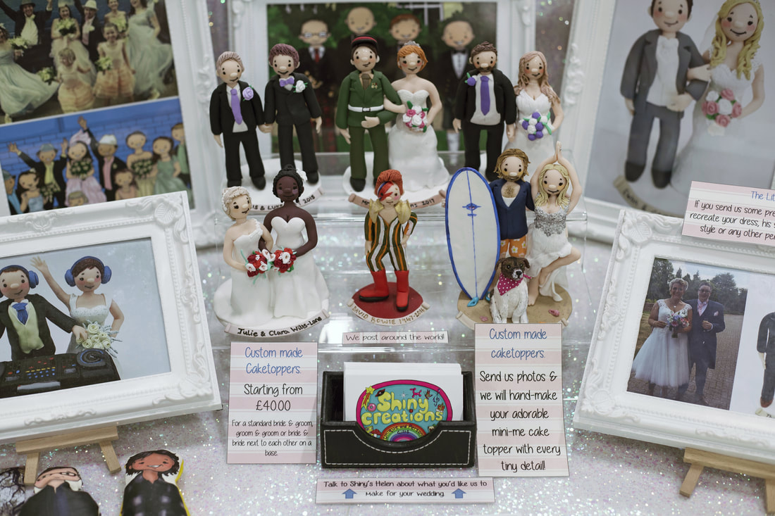 Shiny Creations custom cake toppers at the Wight Bridal Wedding Show, October 2017. Should I bother going to a Wedding Show? - Holly Cade, UK Wedding & Portrait Photographer, based on the Isle of Wight.
