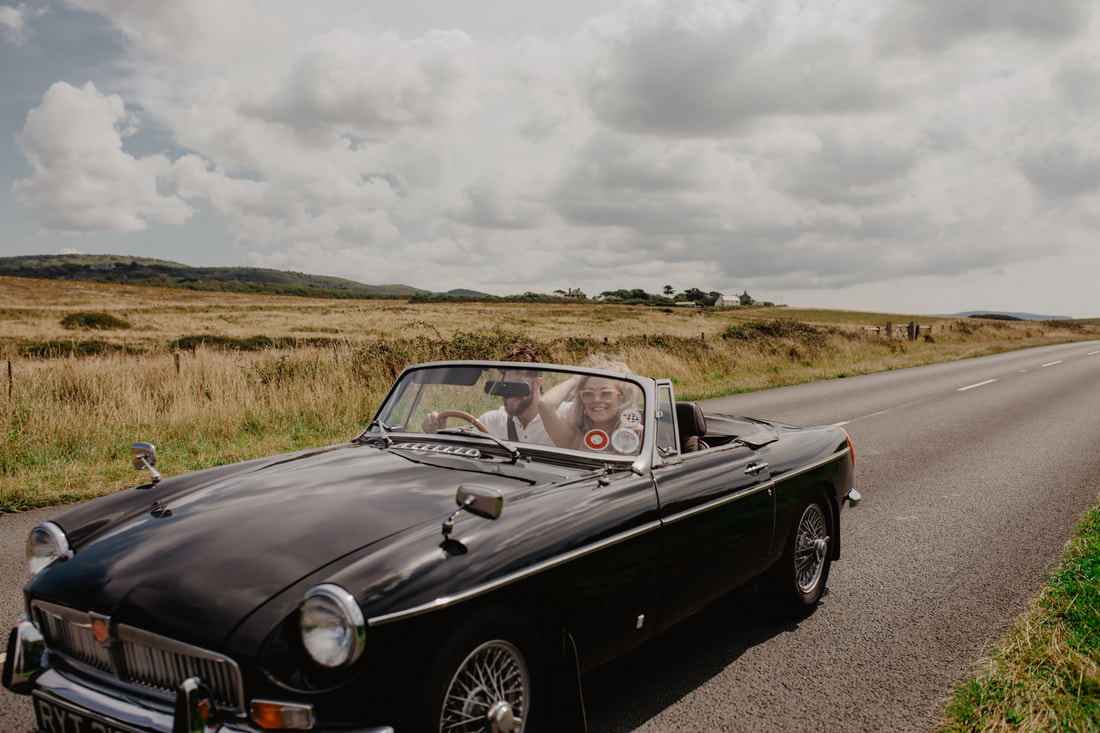 Alexandria & Kieran Engagement Shoot, at Compton Bay with Vintage Car : Holly Cade - Alternative Candid Documentary Wedding & Portrait Photographer. Available to shoot on the Isle of Wight, Portsmouth, Southampton, Hampshire, the South Coast of England, throughout the UK and Worldwide.