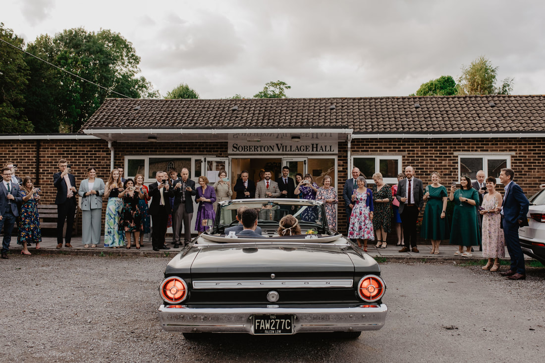 Emma & Greg's Wedding at Winchester Registry Office : Holly Cade - Alternative Candid Documentary Wedding & Portrait Photographer. Available to shoot on the Isle of Wight, Portsmouth, Southampton, Hampshire, the South Coast of England, throughout the UK and Worldwide.