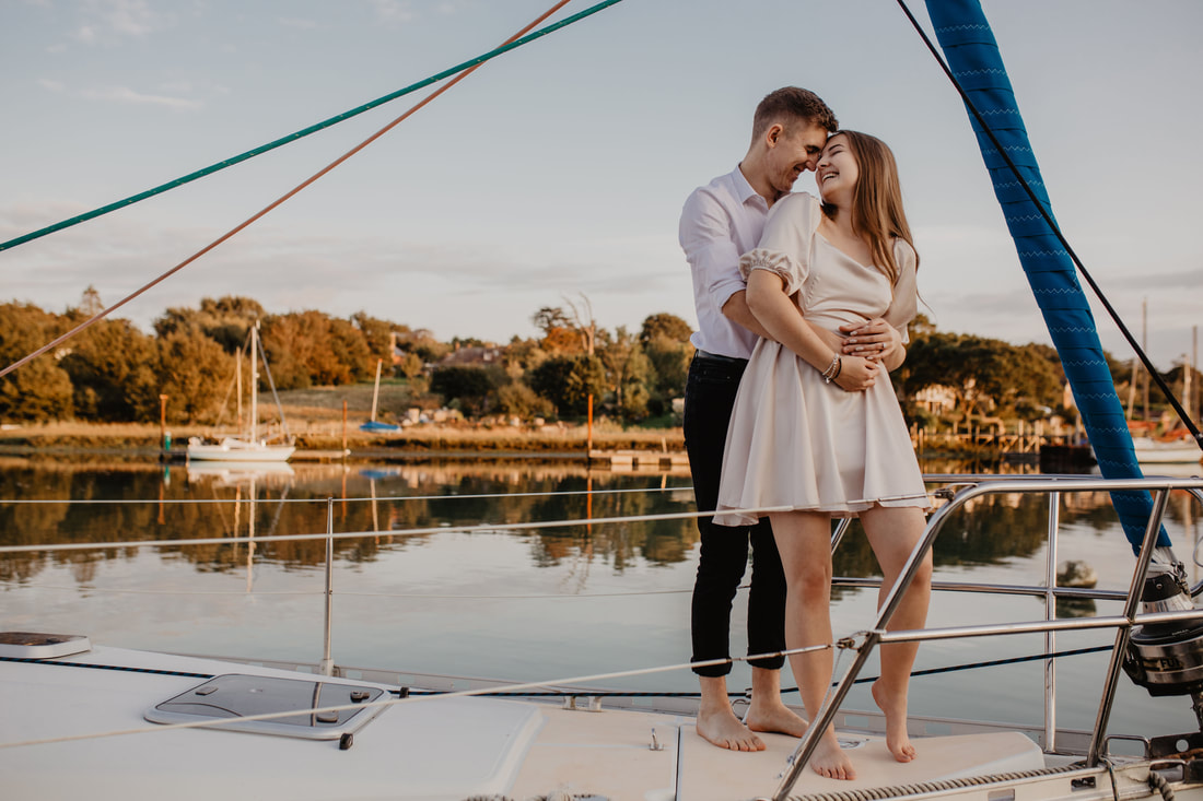 Grace & Jordan's Engagement shoot on a boat Wedding on The Isle of Wight : Holly Cade - Alternative Candid Documentary Wedding & Portrait Photographer. Available to shoot on the Isle of Wight, Portsmouth, Southampton, Hampshire, the South Coast of England, throughout the UK and Worldwide.