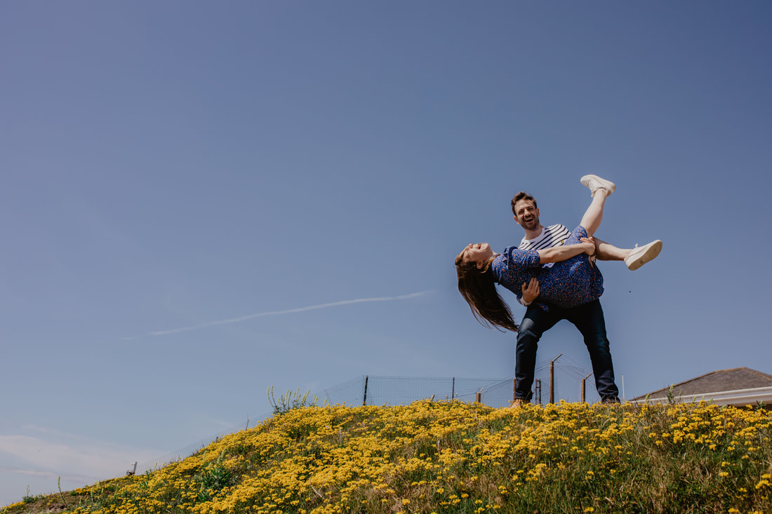 Rob & Izzy's Engagement Shoot at The Needles by Holly Cade - Alternative Candid Documentary Wedding & Portrait Photographer on the Isle of Wight.