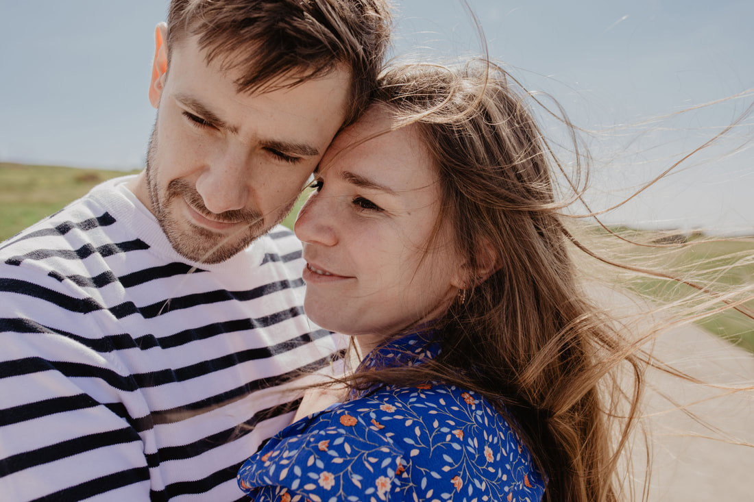 Rob & Izzy's Engagement Shoot at The Needles by Holly Cade - Alternative Candid Documentary Wedding & Portrait Photographer on the Isle of Wight.