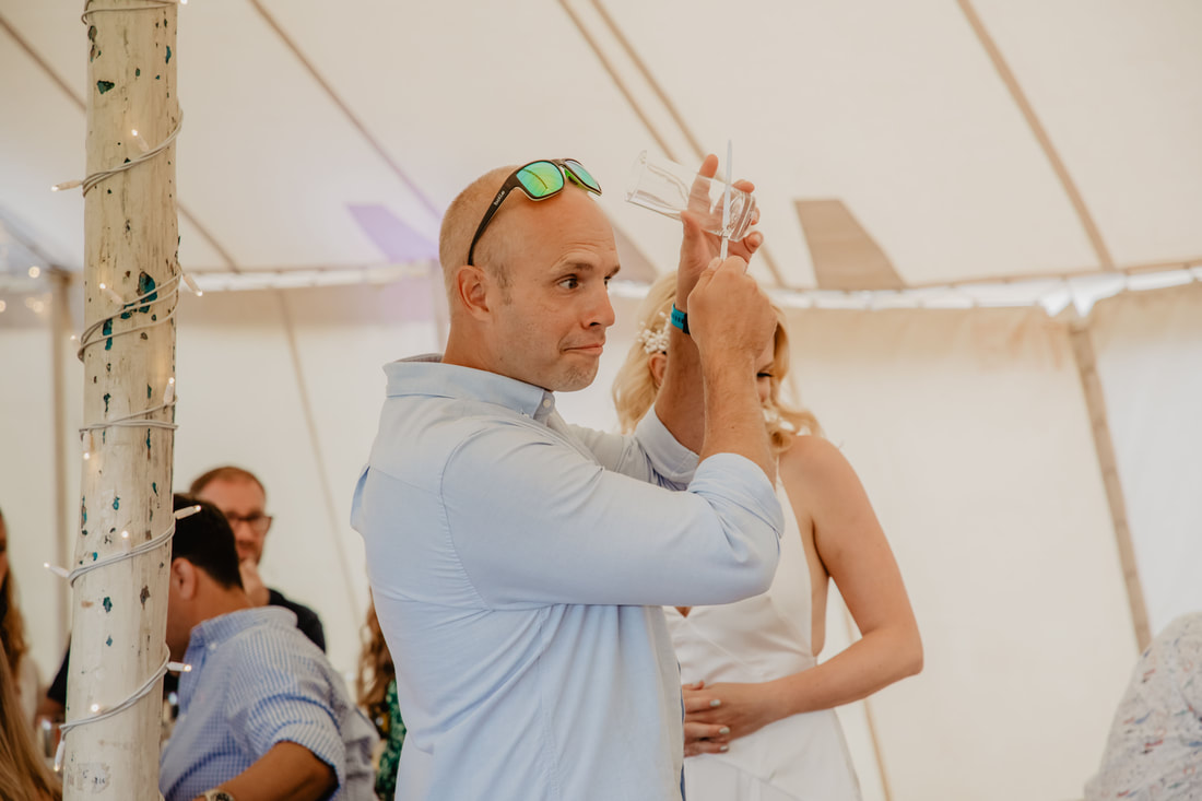 Jen & Nick's Festival Styled Clifftop Wedding at Compton Beach - Holly Cade - Alternative Candid Documentary Wedding & Portrait Photographer. Available to shoot on the Isle of Wight, Portsmouth, Southampton, Hampshire, the South Coast of England, throughout the UK and Worldwide.