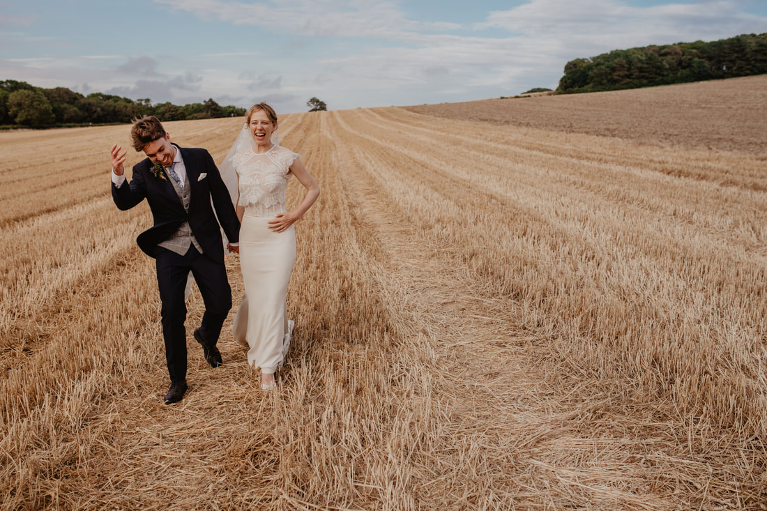 Lizzie & Harry Summer New Barn Farm Wedding by Holly Cade - Alternative Candid Documentary Wedding & Portrait Photographer. Available to shoot on the Isle of Wight, Portsmouth, Southampton, Hampshire, the South Coast of England. 