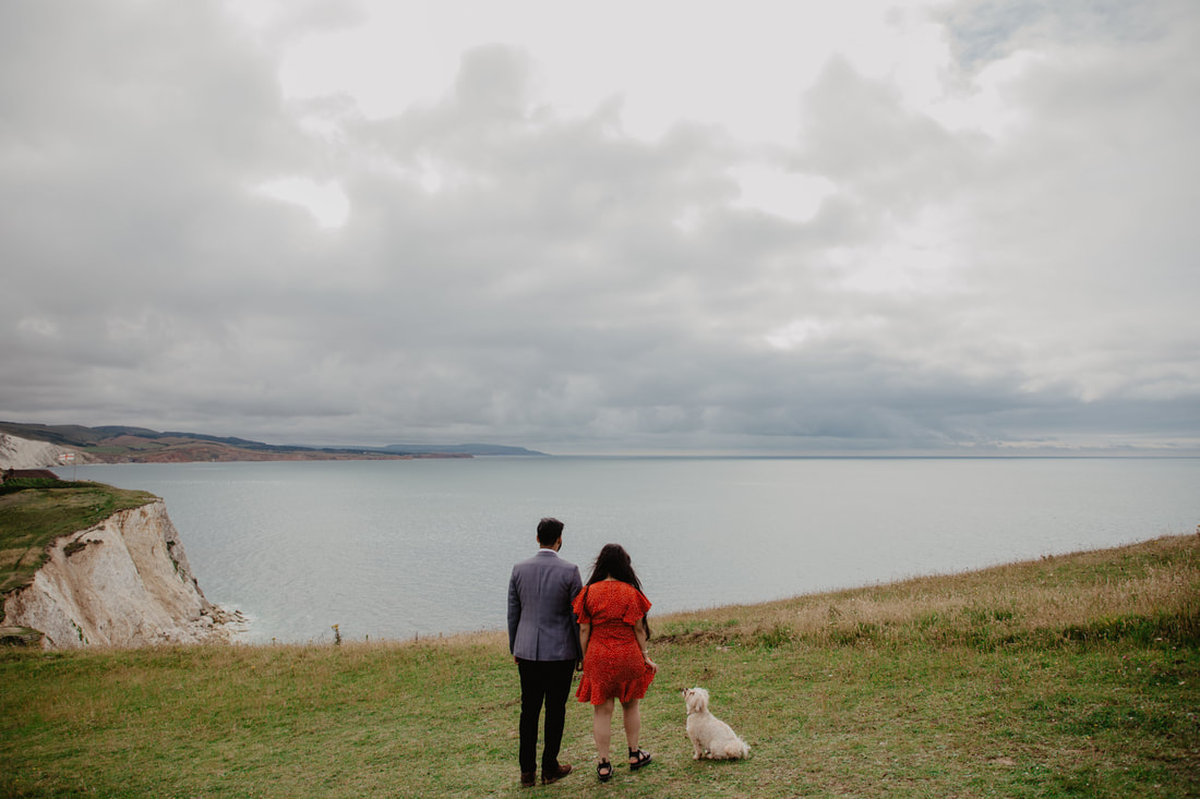 Nav & Talveen's Engagement Shoot in Freshwater Bay, Isle of Wight with their cute dog  : Holly Cade - Alternative Candid Documentary Wedding & Portrait Photographer. Available to shoot on the Isle of Wight, Portsmouth, Southampton, Hampshire, the South Coast of England, throughout the UK and Worldwide.