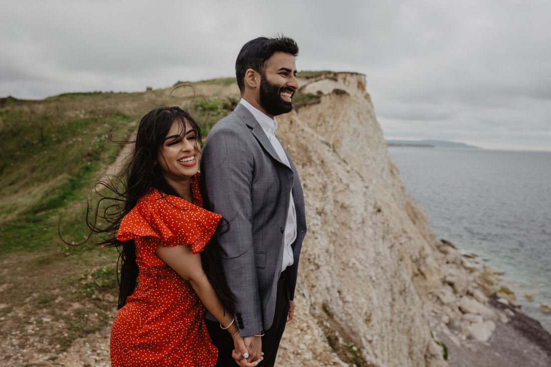 Nav & Talveen's Engagement Shoot in Freshwater Bay, Isle of Wight with their cute dog  : Holly Cade - Alternative Candid Documentary Wedding & Portrait Photographer. Available to shoot on the Isle of Wight, Portsmouth, Southampton, Hampshire, the South Coast of England, throughout the UK and Worldwide.
