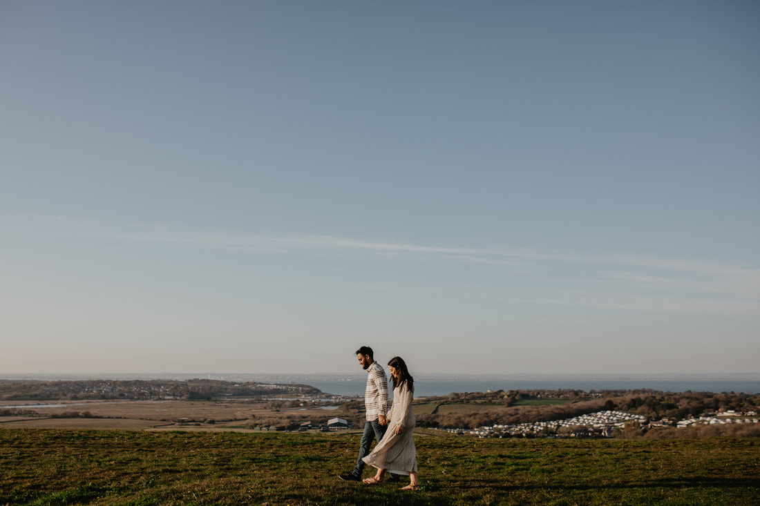 Rosie & Dhruve's Engagement Shoot at Culver Down & Wedding at New Barn Farm, Isle of Wight : Holly Cade - Alternative Candid Documentary Wedding & Portrait Photographer. Available to shoot on the Isle of Wight, Portsmouth, Southampton, Hampshire, the South Coast of England, throughout the UK and Worldwide.